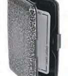 Patterned aluminium concertina credit card case with a push clasp closure.